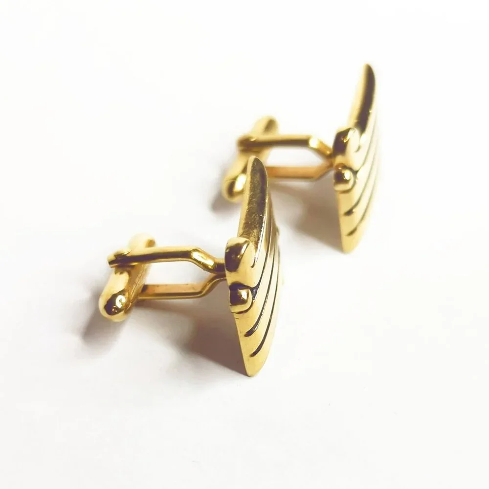 Vintage Swank Gold Tone Cufflinks With Modernist Scroll Design